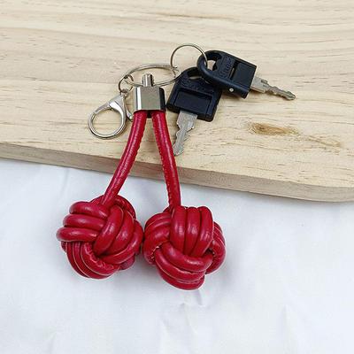 Porte-clés en cuir tressé avec nœud de poing de singe, pendentif pour sac à dos, mignon et simple, ornement à suspendre, accessoire cadeau