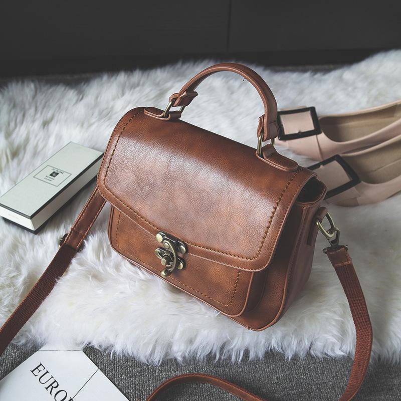2025 new small square bag retro style portable bag retro lock popular women's bag simple small bag