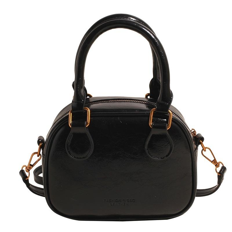 Temperament retro senior sense portable bowling bag versatile commuting niche casual simple wind messenger women's bag