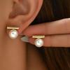 Niche Design White Pearl Stud Earrings for Women - Retro High-End Style, 2026 Autumn/Winter Collection.