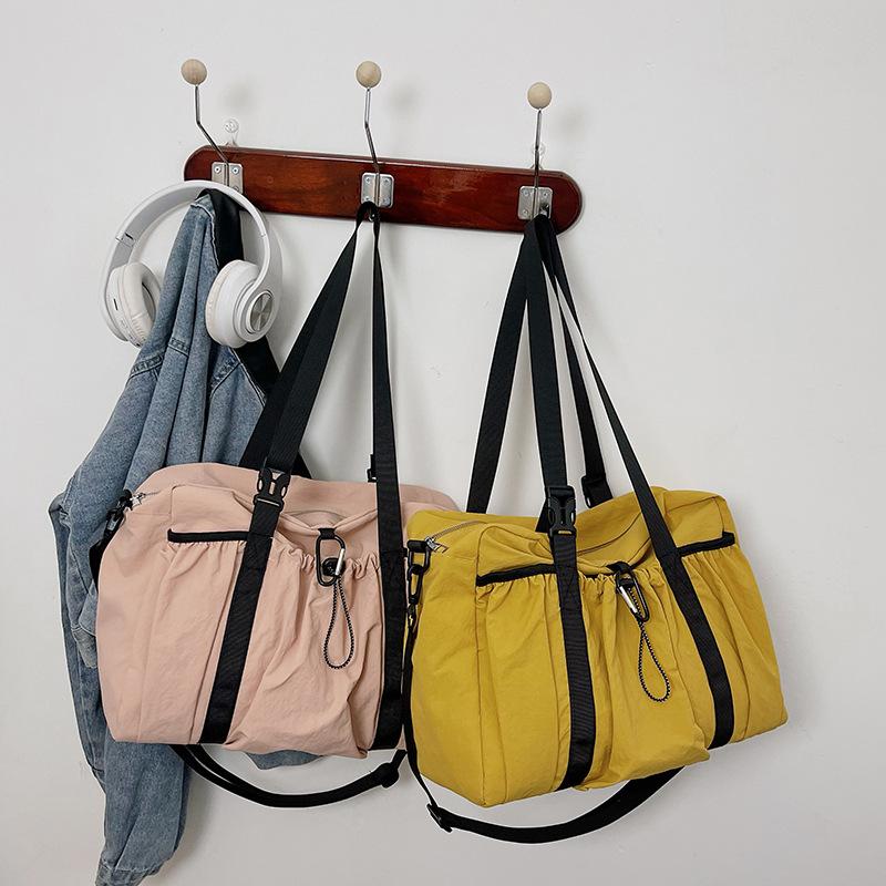 Korean version of lazy wind large-capacity travel bag leisure sports fitness bag premium niche shoulder messenger bag tote bag