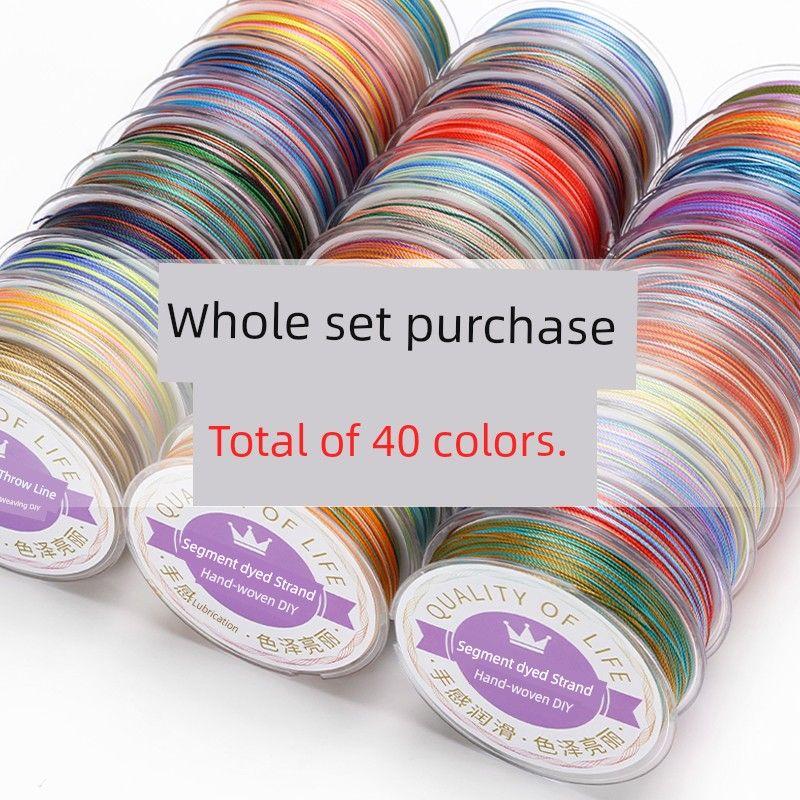 

Прядь 15-прядная Маленький рулон Разноцветная плетеная веревка Девять фиолетовых от огня Тысячелие Пейзаж Ручная работа Плетеная пластина Плетеный браслет из драконьей чешуи Цепочка на запястье Complete set of 42 colors