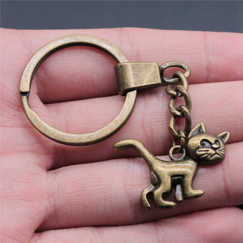 

Cat Dog Rabbit Cute Pets Trio Antique Bronze Metal Keychain Best Seller Gift for Animal Lovers A18-1pcs-30x22mm