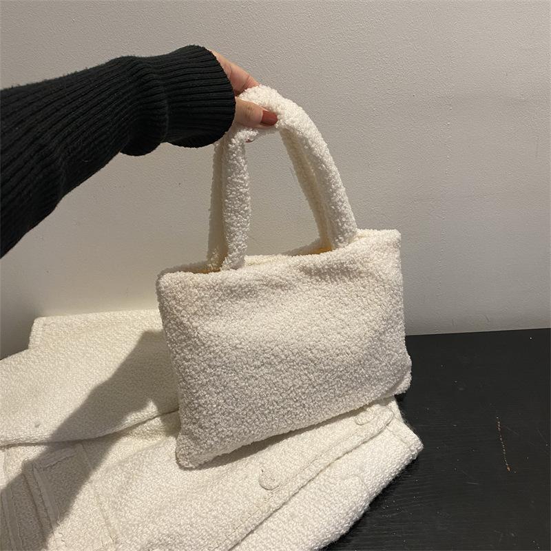

Autumn and winter women s hand-held plush small bag women s 2026 new fashion fluffy hand bag белый
