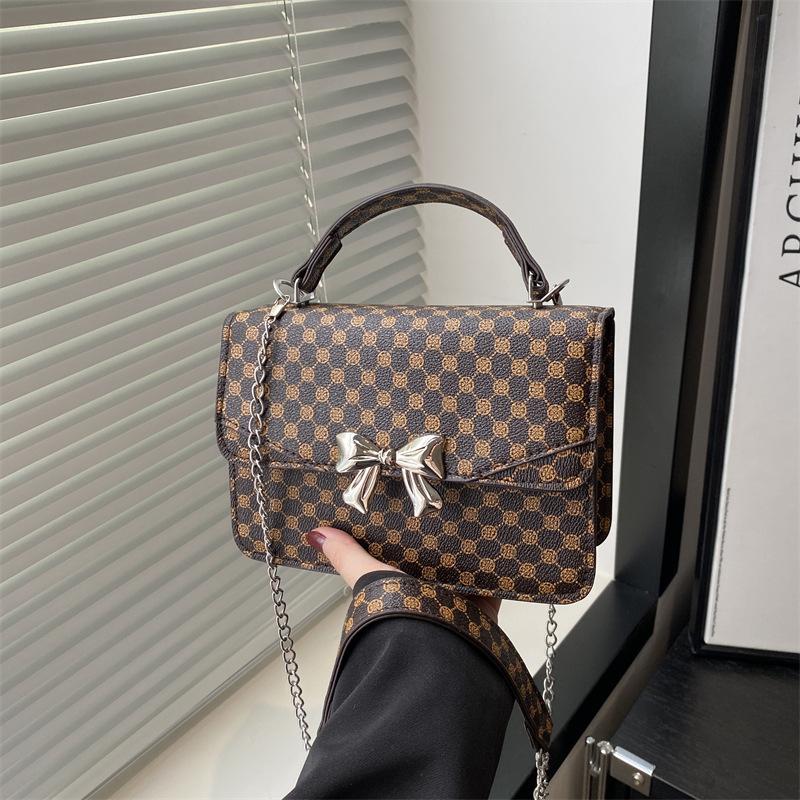 

Mini beautiful bow solid color sweet small square bag 2025 autumn new foreign style chain single shoulder messenger bag women