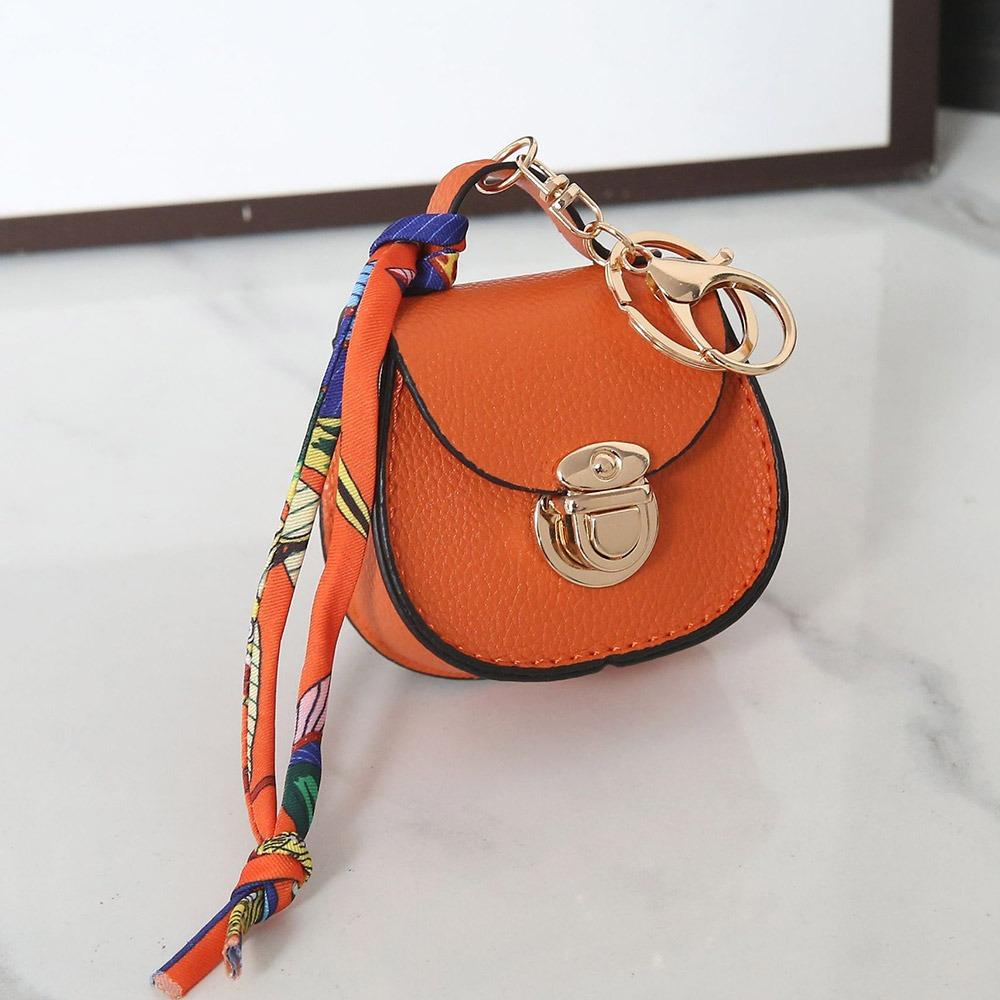 

New Keychain Small Coin Purse Premium Leather Multifunction Earphone Bag Women s Bag Pendant for Women помаранчевий