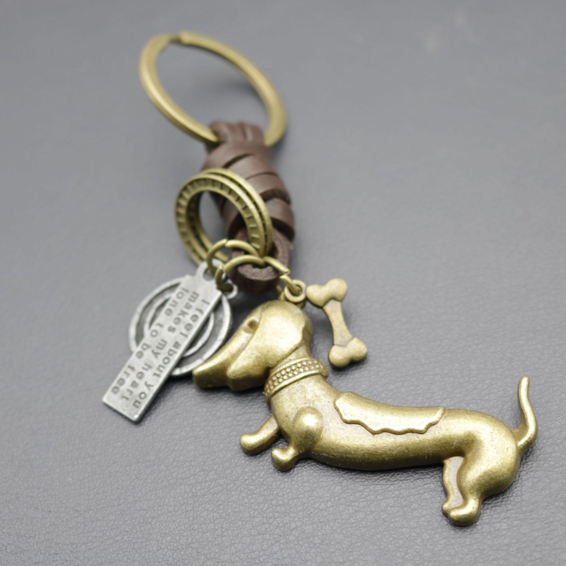 Retro Alloy Dog Bone Keychain with Woven Cowhide