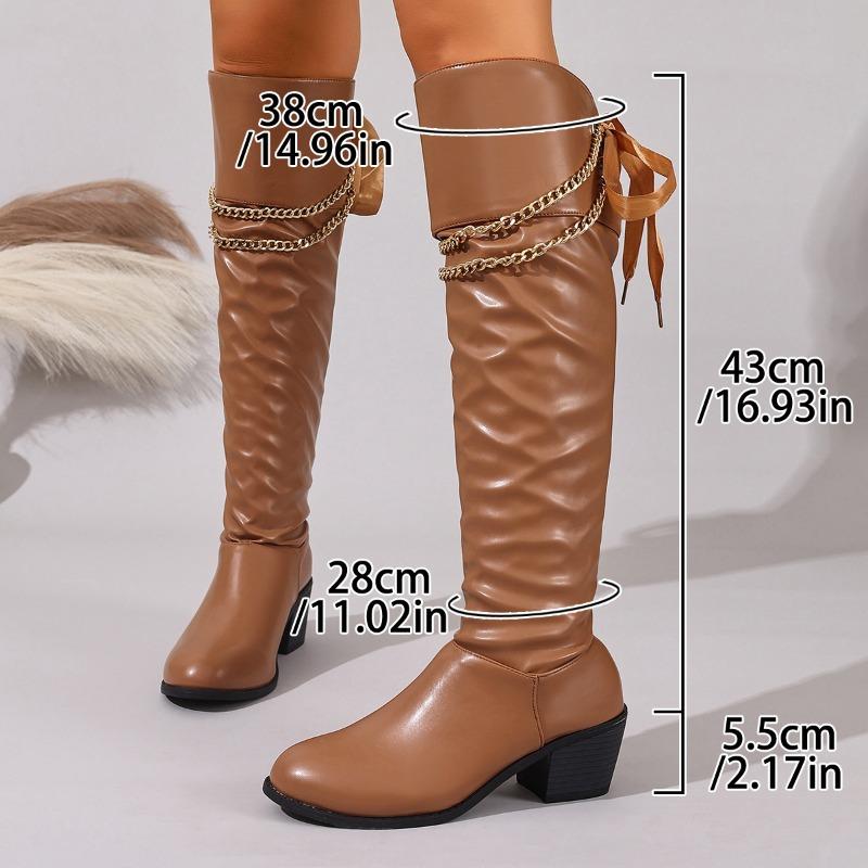 Nowy styl butów jeździeckich damskich na jesień/zimę 2025: retro metalowy łańcuch szpiczasty nosek, gruby obcas, kozaki do kolana
