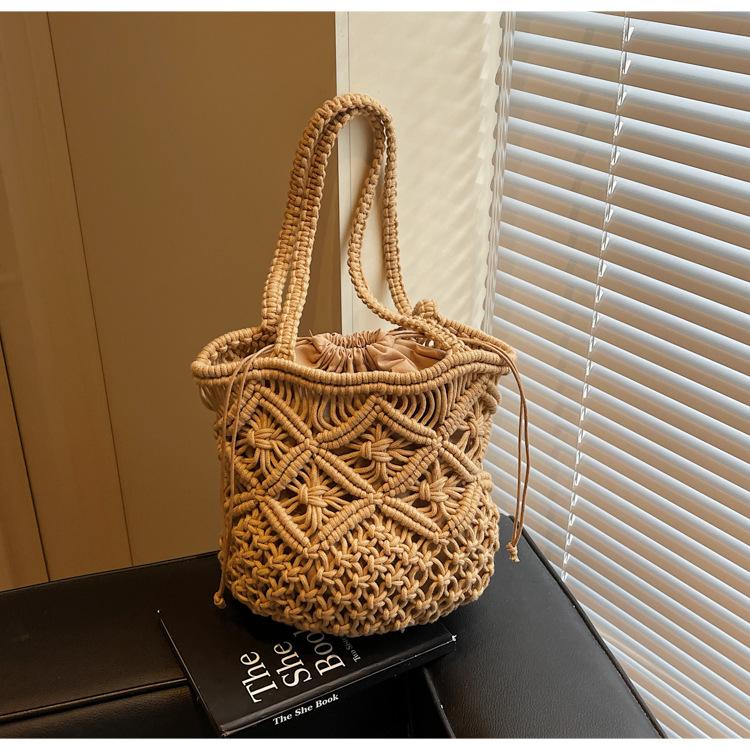 Simple Cotton Thread Shoulder Woven Bag New Summer Niche Hollow Straw Bag Portable Women's Bag Vacation Beach Bag