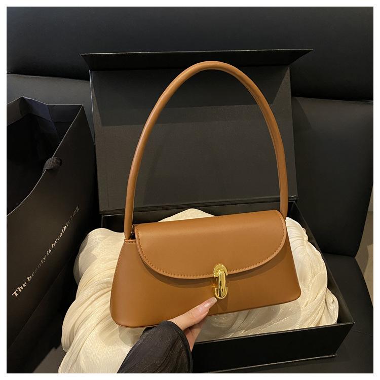 

Нишевая ретро простая сумка-багет под мышкой 2025 новая модная высококлассная текстурная универсальная сумка через плечо тренд коричневый