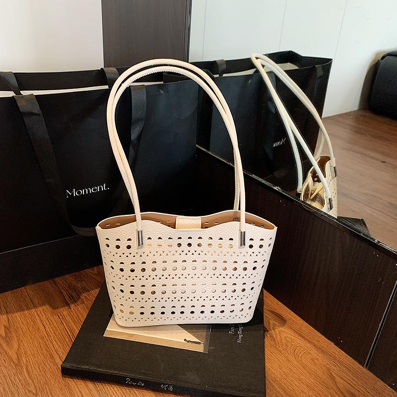 Large-capacity hollow bag women's summer versatile shoulder mother and child bag leisure work commuter tote bag