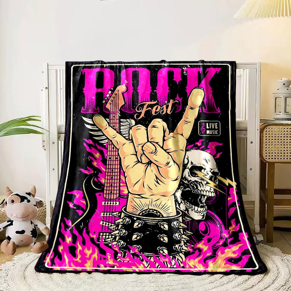 

A rock-themed design featuring a hand gesture, guitar, flames, and skulls. for all seasons blanket lunch break throw gift 80cm x 120cm