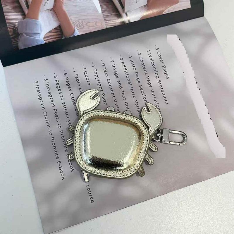 2025 New Leather Pendant Head Layer Leather Mini Earphone Bag Crab Pendant Wallet Cross Border