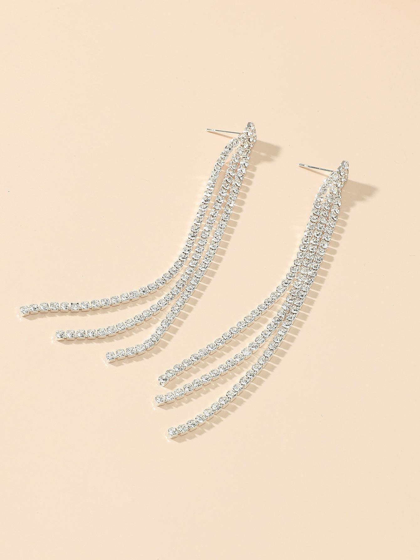 

Серьги-пусеты с кисточками из страз в три ряда для ужина и банкета белый