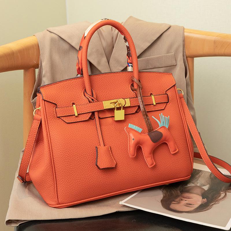 

Сумка Cross Border для женщин, новая сумка из натуральной кожи Platinum, высококачественная текстура, большая вместимость, женская сумка через плечо 30x16.5x23cm оранжевый