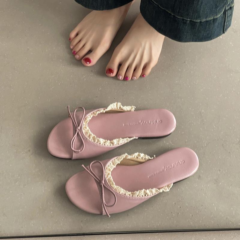 Flat-bottomed one-word tow shoes female French bow exquisite fairy style 2025 summer outer wear new non-slip cool slippers