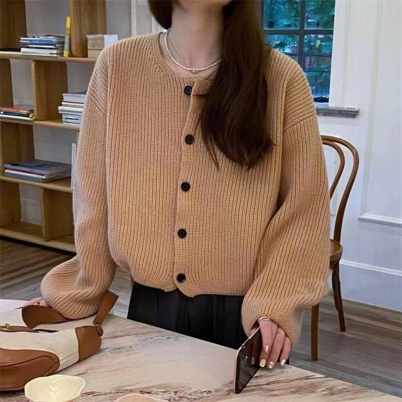 Short solid color knitted sweater jacket for women's autumn and winter new loose and simple round neck knitted cardigan for women