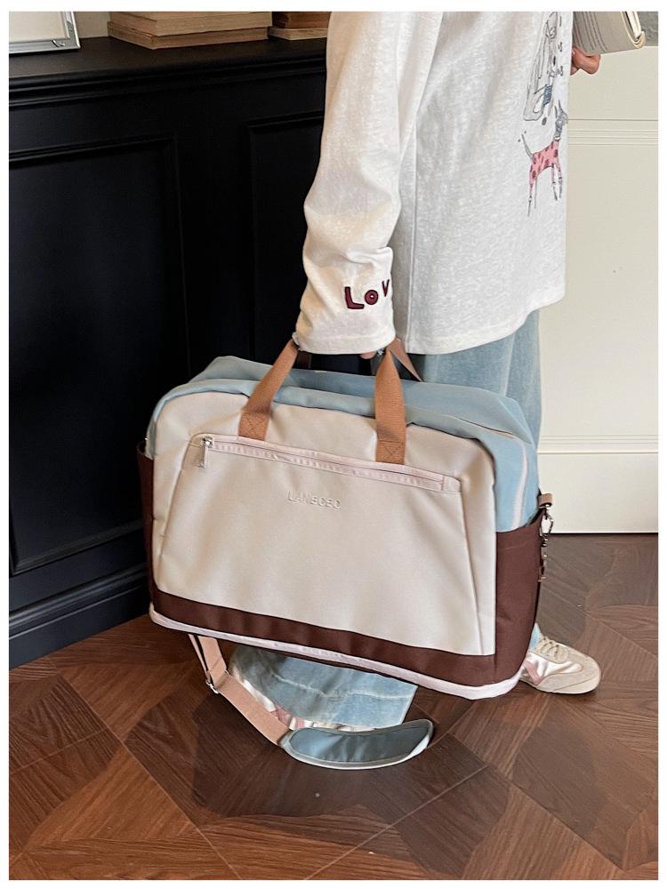 Large Capacity Casual Travel Bag: New Style Lightweight Handheld & Shoulder Luggage Storage for Couples
