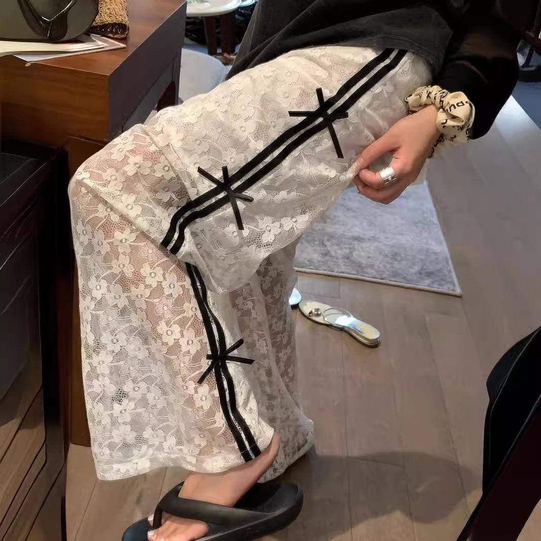 

Женские летние брюки с цветными блоками, кружевной отделкой пэчворк и бантом, широкие штанины Large (L) белый