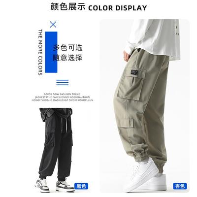 Pantalon décontracté pour homme printemps et automne ample pieds attachés polyvalent outillage grande taille fin plus de poches taille élastique couleur unie cyan