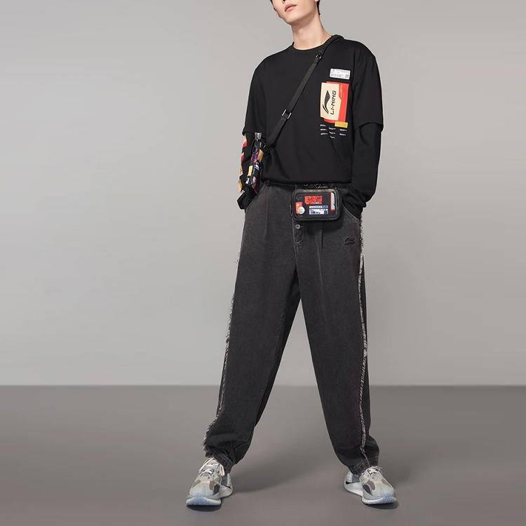 Li Ning Sports Basketball Series Logo Print Locker geschnittenes Langarm-T-Shirt Herbst Unisex Oberteile Schwarz AHSR823-2