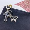 Thorn Crucifix Keychain for Women Stylish Butterfly Keyrings for Fashion Lovers