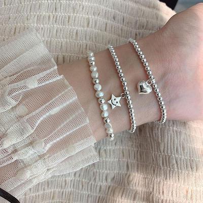 Korean S925 Silver-Plated Bead Elastic Bracelet with Star, Pearl, and Heart Charms – Retro, Fashionable, and Creative Design for Women.