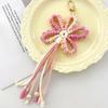 Explosive exquisite handmade woven flower tassel bag pendant with rustic style and creative car keychain pendant