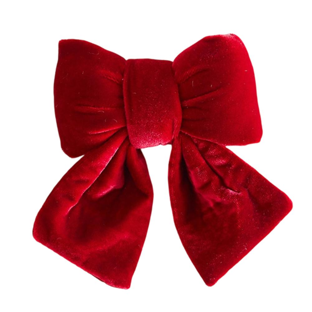 

Christmas bow with dimensional velvet design suitable for wreath and tree decorations during the holiday season