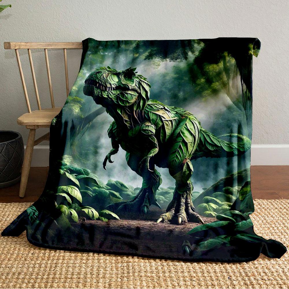 A dinosaur-shaped figure created entirely from overlapping green leaves. for all seasons blanket lunch break throw gift