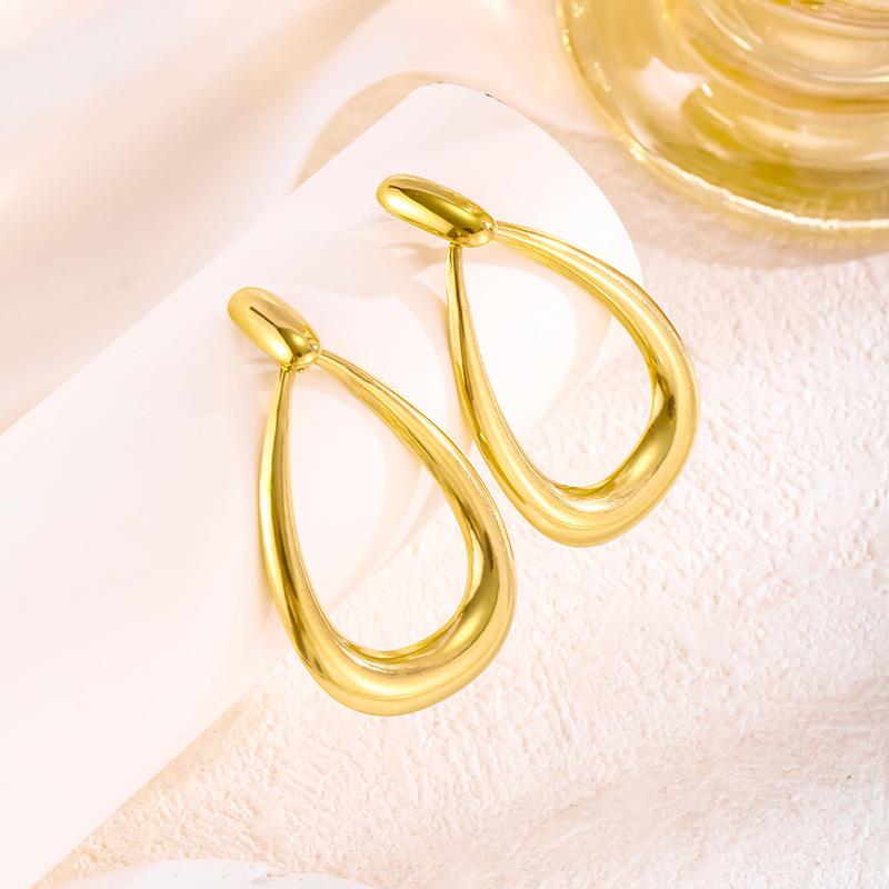 Oval Water Drop Titanium Steel Earrings for Women - Elegant French-European Style, Hollow Design, Exaggerated Studs, High-End Fashion.