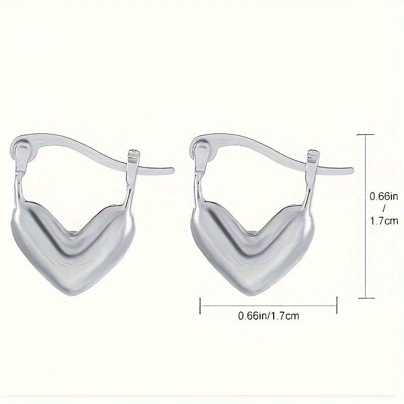 A Pair of Silver Heart-shaped Earrings, Unisex Bohemian Retro Style, Love Themed Jewelry, A Perfect Gift Accessory for Versatile Temperament.
