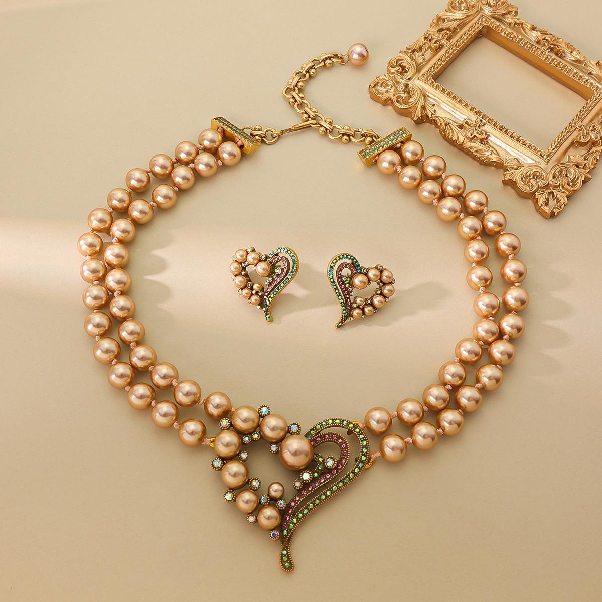 

Cross-border Vintage Fashion Versatile Plated Russian Gold Multi-layer Bead Peach Heart Pendant Necklace Earrings