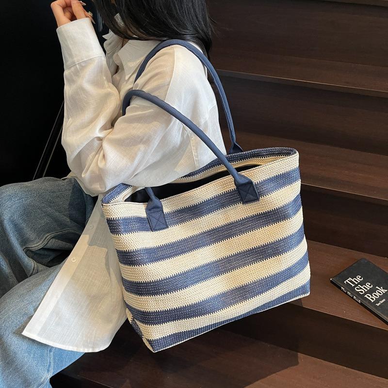 Neue Umhängetasche gestreift kontrastfarbig fließend modisch gewebte Tragetasche große Kapazität Stroh gewebt tragbare Tragetasche