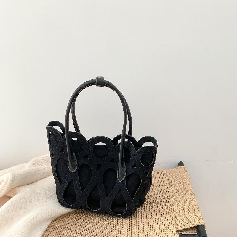 Borsa rétro in camoscio traforato autunno e inverno nuova borsa a cesto tote borsa a mano trend di nicchia creativa