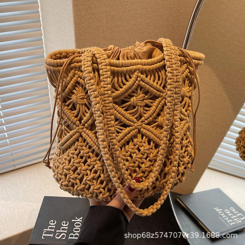 Literary and simple cotton thread shoulder woven bag women's 2025 new hollow niche handmade straw bag handbag women