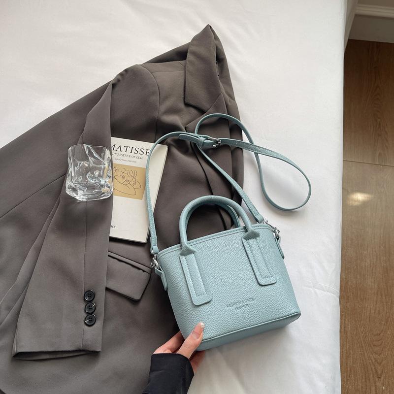 Autumn and winter new small bag women's premium texture portable bucket bag versatile retro commuter messenger bag