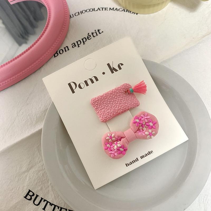 Koreańska spinka do włosów z kokardką w kolorze różowym, idealna do dziecięcych grzywek i kręconych włosów