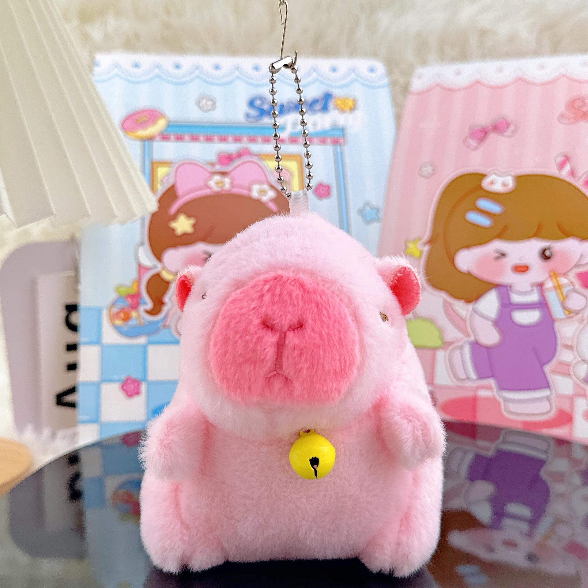 

Плюшевый брелок-морская свинка с колокольчиком - Кукла капибара, украшение для рюкзака Approximately 11 cm High