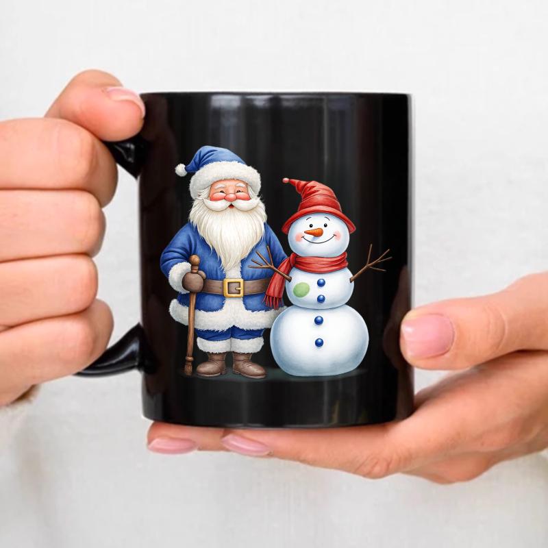 Ceramic mugs with black Santa and snowman Christmas designs for holiday coffee and tea чёрный
