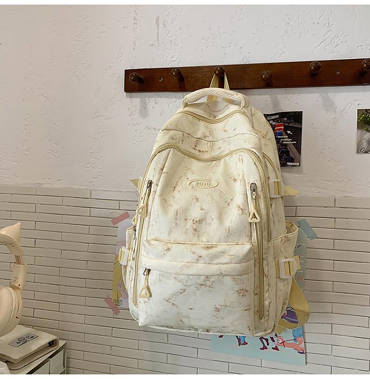 

Large capacity campus schoolbag female Korean version junior high school students simple tie-dye high school backpack ins wind Japanese backpack single pack жовтий
