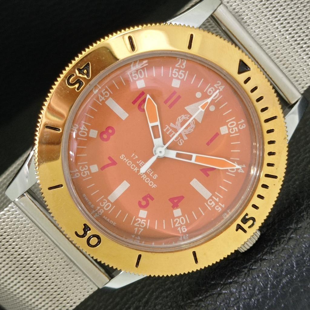 

ШВЕЙЦАРСКИЕ ВИНТАЖНЫЕ ЧАСЫ TITUS С РУЧНЫМ ЗАВОДОМ, МУЖСКИЕ, ВРАЩАЮЩИЙСЯ БЕЗЕЛЬ, ОРАНЖЕВЫЙ ЦИФЕРБЛАТ a700009-5 R201-a700009