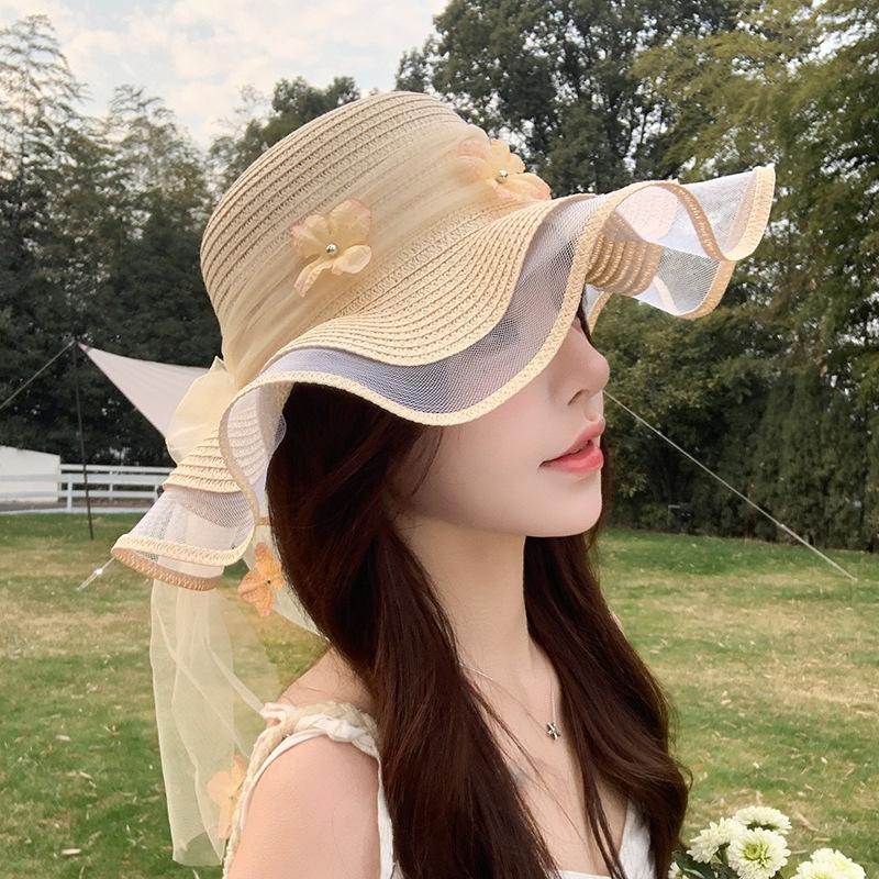 Straw hat women's summer seaside big brim sun hat new outdoor travel leisure wave three-dimensional flower streamer sun hat