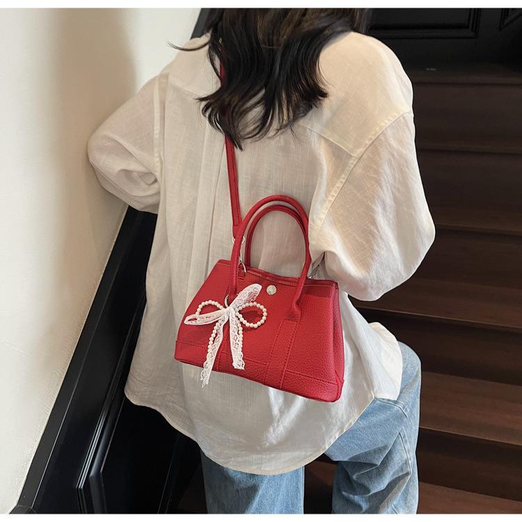 Niche design bags, new summer versatile messenger bags, popular portable bucket bags today