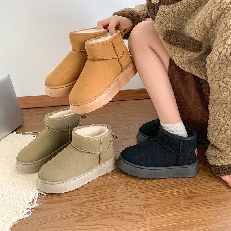 Autumn and winter snow boots women's 2025 new thick-soled thickened thermal cotton shoes with one foot pedal solid color short tube cold-proof boot