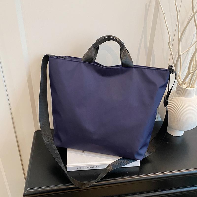 

Сумка-тоут большой вместимости женская лето 2025 новая простая и универсальная сумочка на плечо, сумка-мессенджер синий