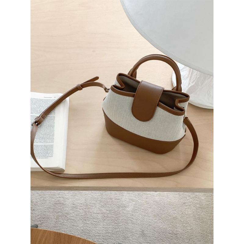 

Commuter canvas bag women s creative leather splicing design small hand bag fashionable new shoulder messenger bag хаки