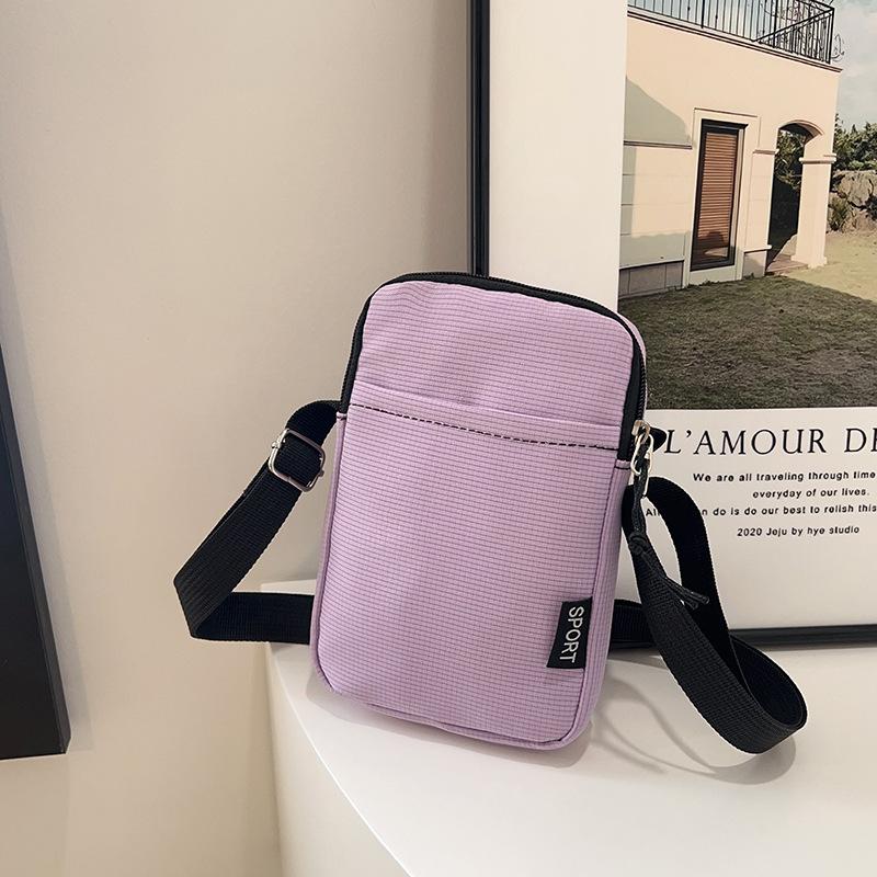 Multi-color mobile phone bag, large-capacity shoulder bag, simple and fashionable messenger bag, solid color change bag, nylon small backpack.
