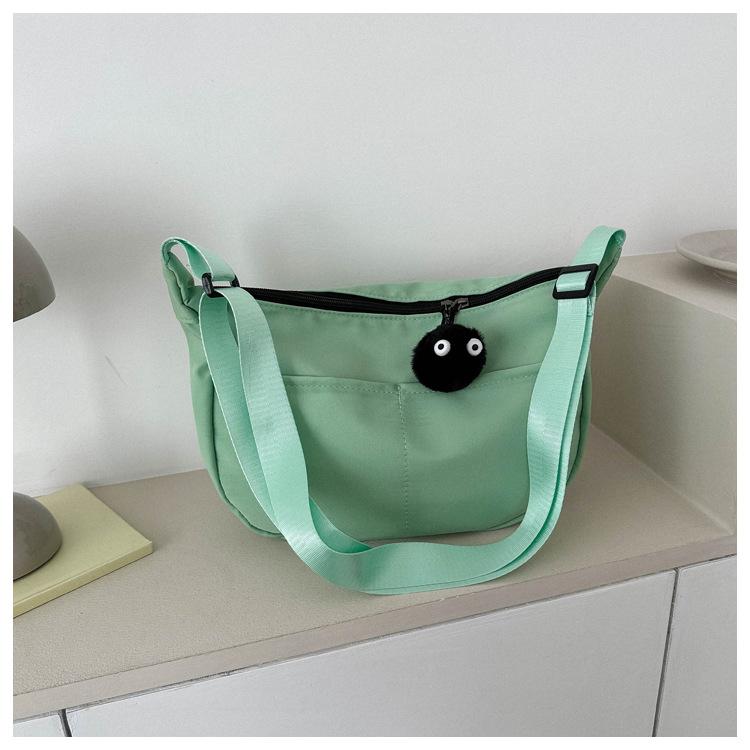 Spring new fashionable versatile solid color messenger bag casual simple dumpling bag street trend large capacity schoolbag