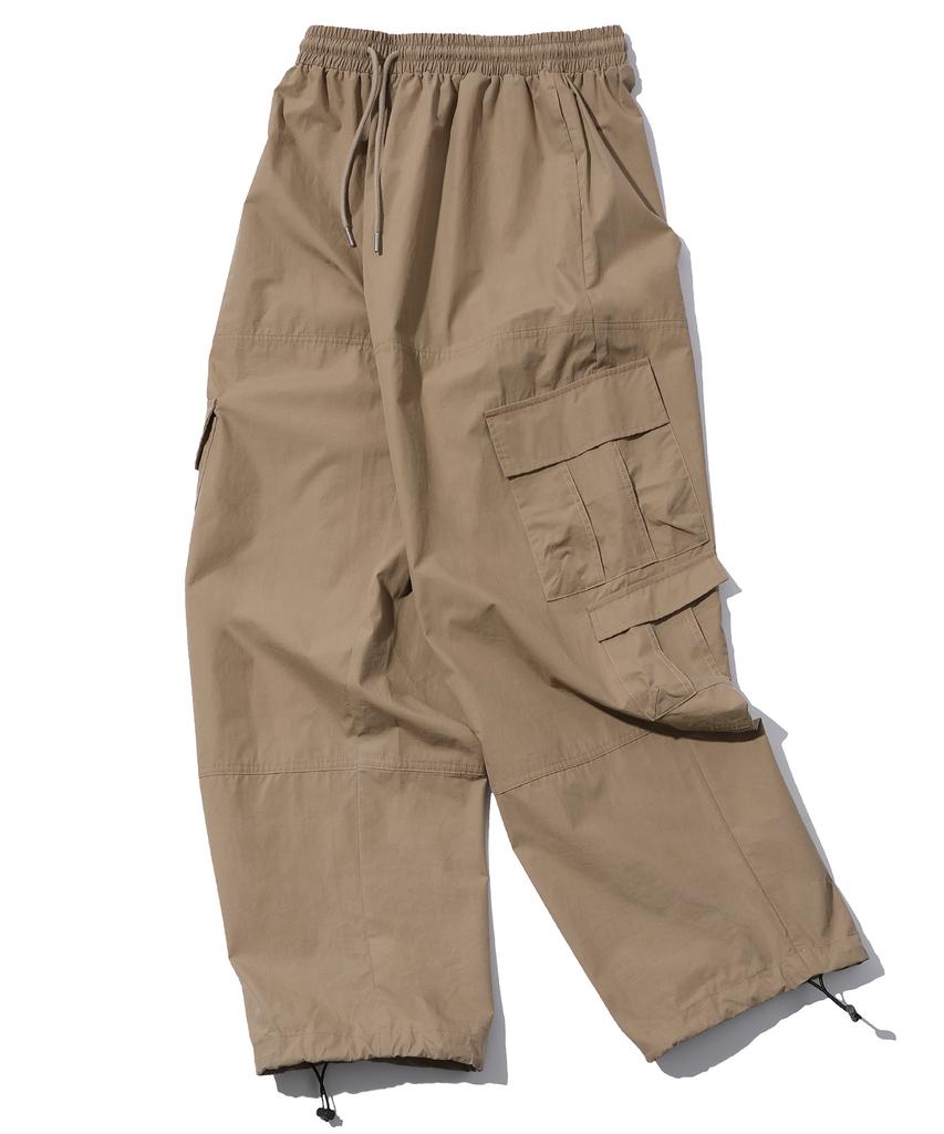 CPGN STUDIO Weite Cargohosen Beige